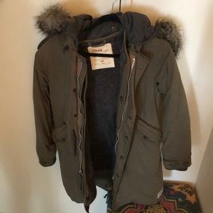 TNA Britannia 3 in 1 jacket in forest green.